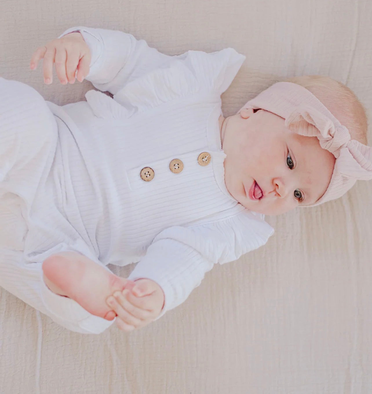 Boki Long-Sleeve Ruffled Ribbed Growsuit