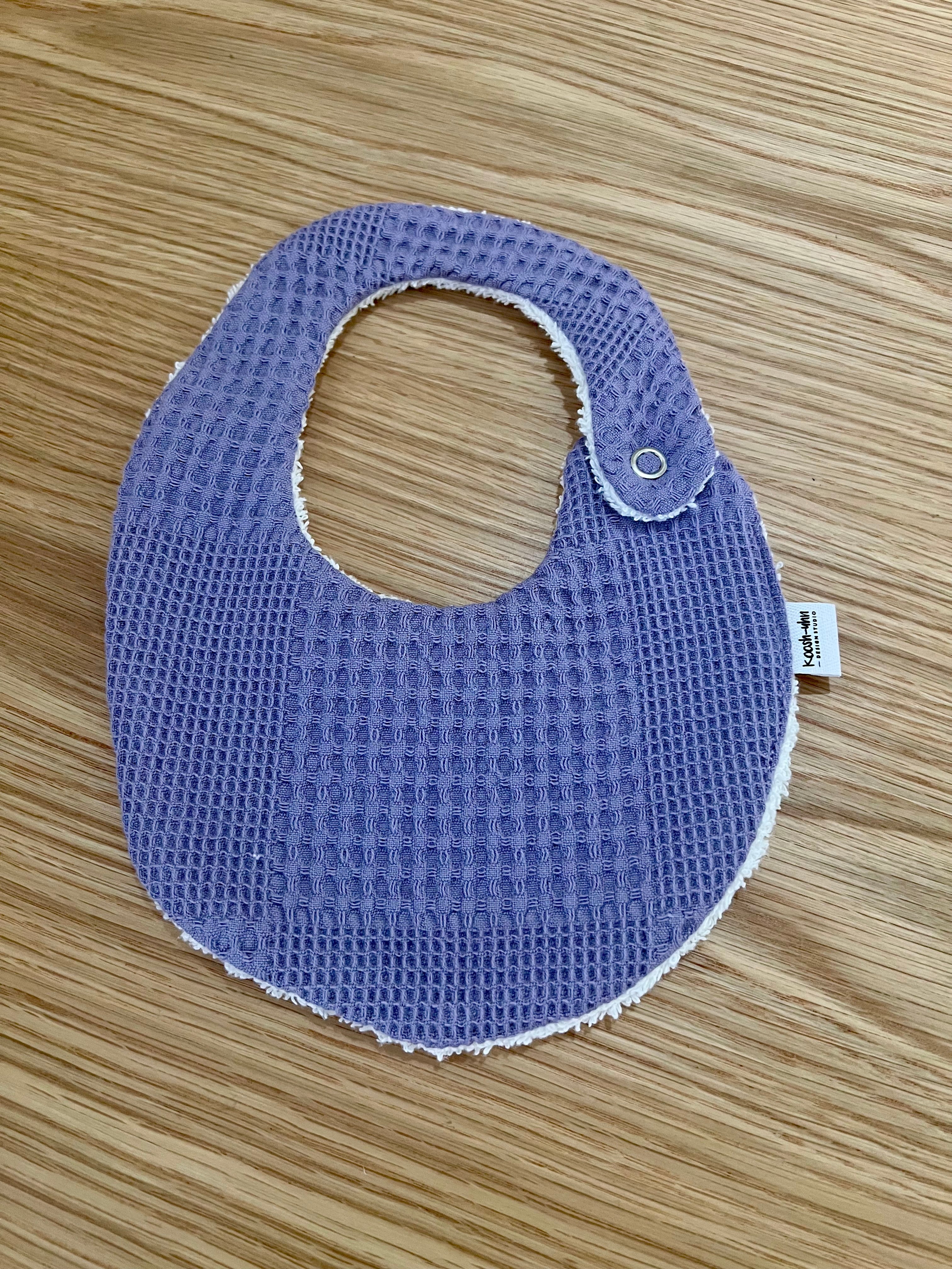 Koosh-uhn Bibs
